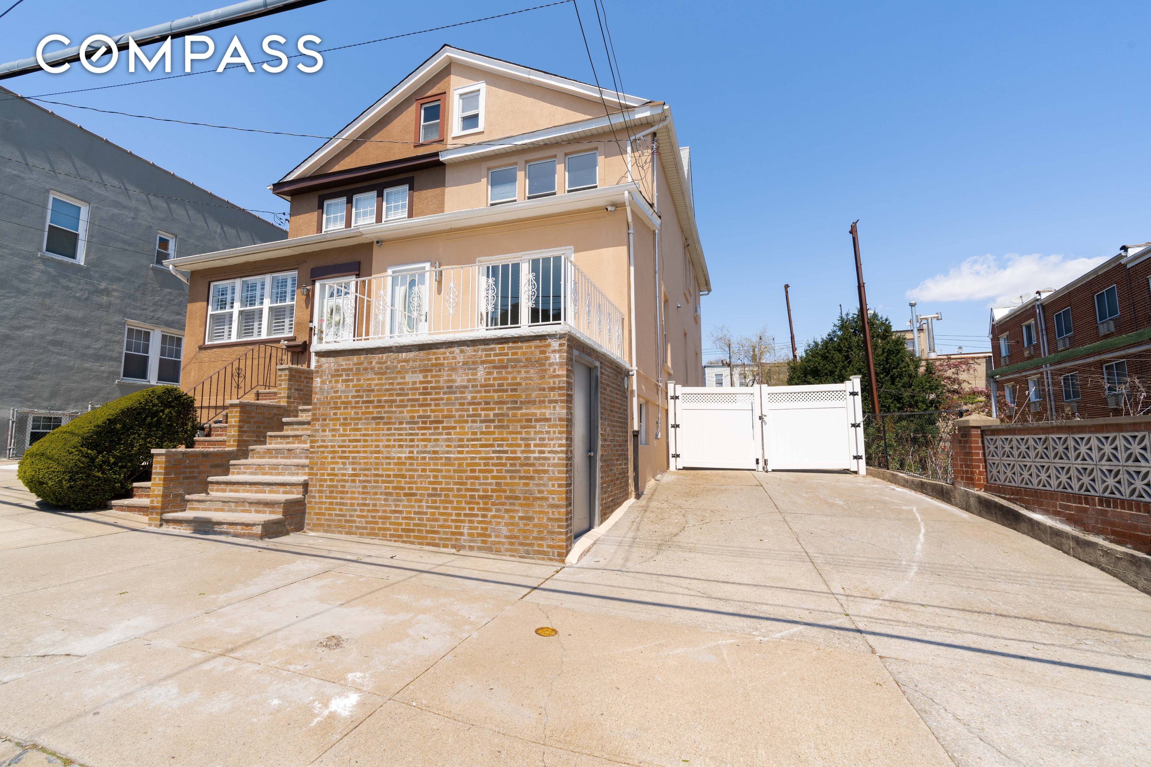 Carefully designed colonial style semi detached town house with two car garages and a private driveway.