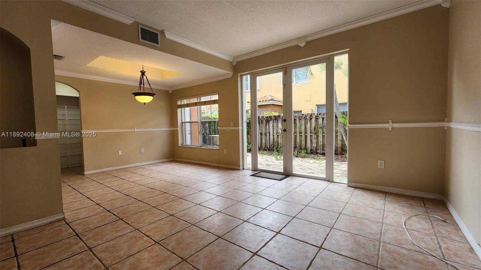 OWN A BEAUTIFUL 2 STORY TOWNHOME IN THE HEART OF MIAMI LAKES !