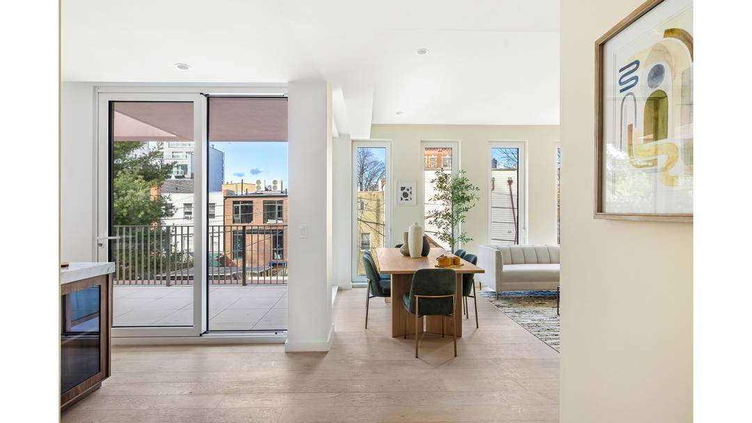 109 Devoe Street is a modern residential building defined by distinctive architecture, elongated proportions, and an emphasis on light and openness.