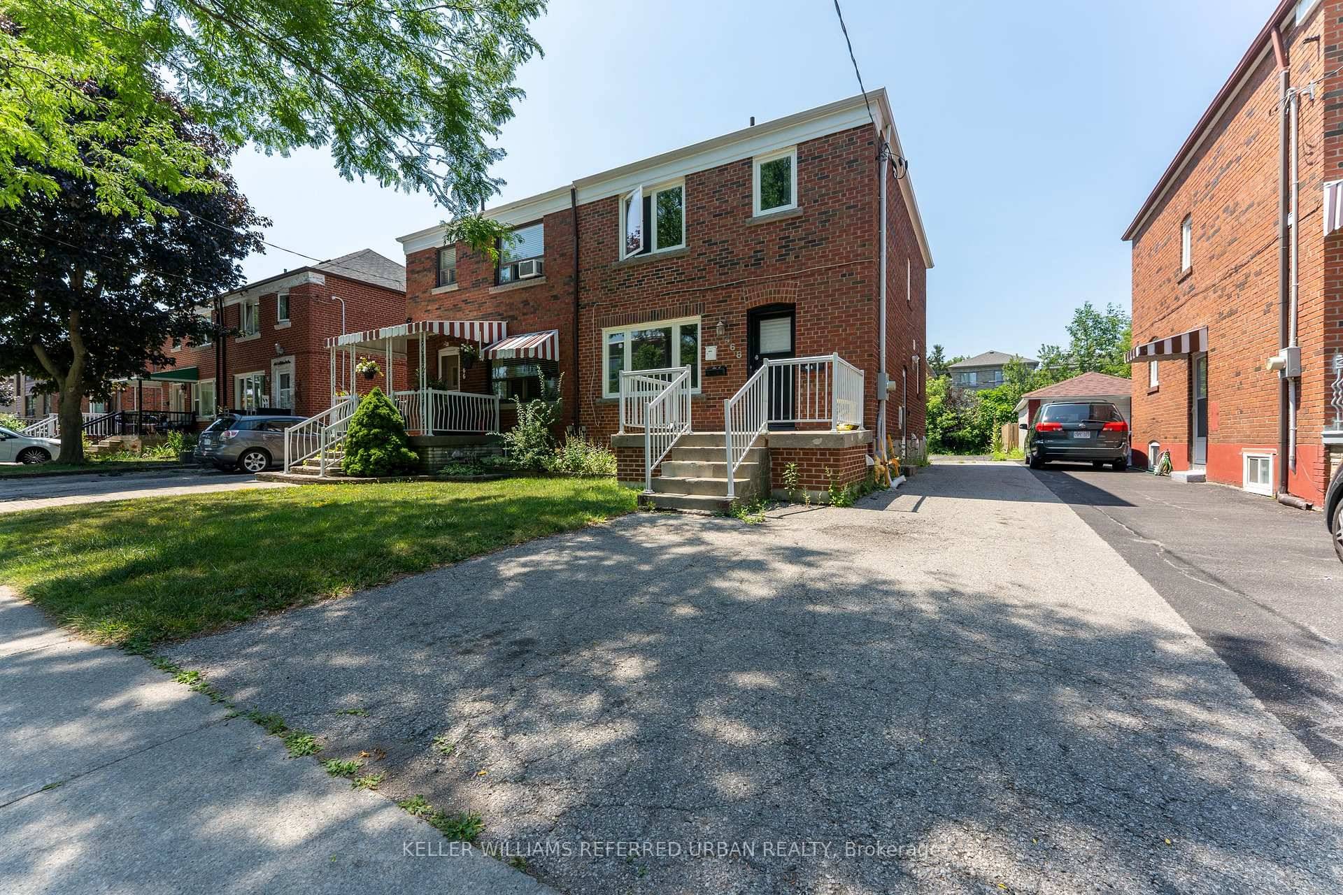Bright and functional 515 sq ft lower level unit featuring a generous family room, kitchen, bathroom, laundry, and storage.