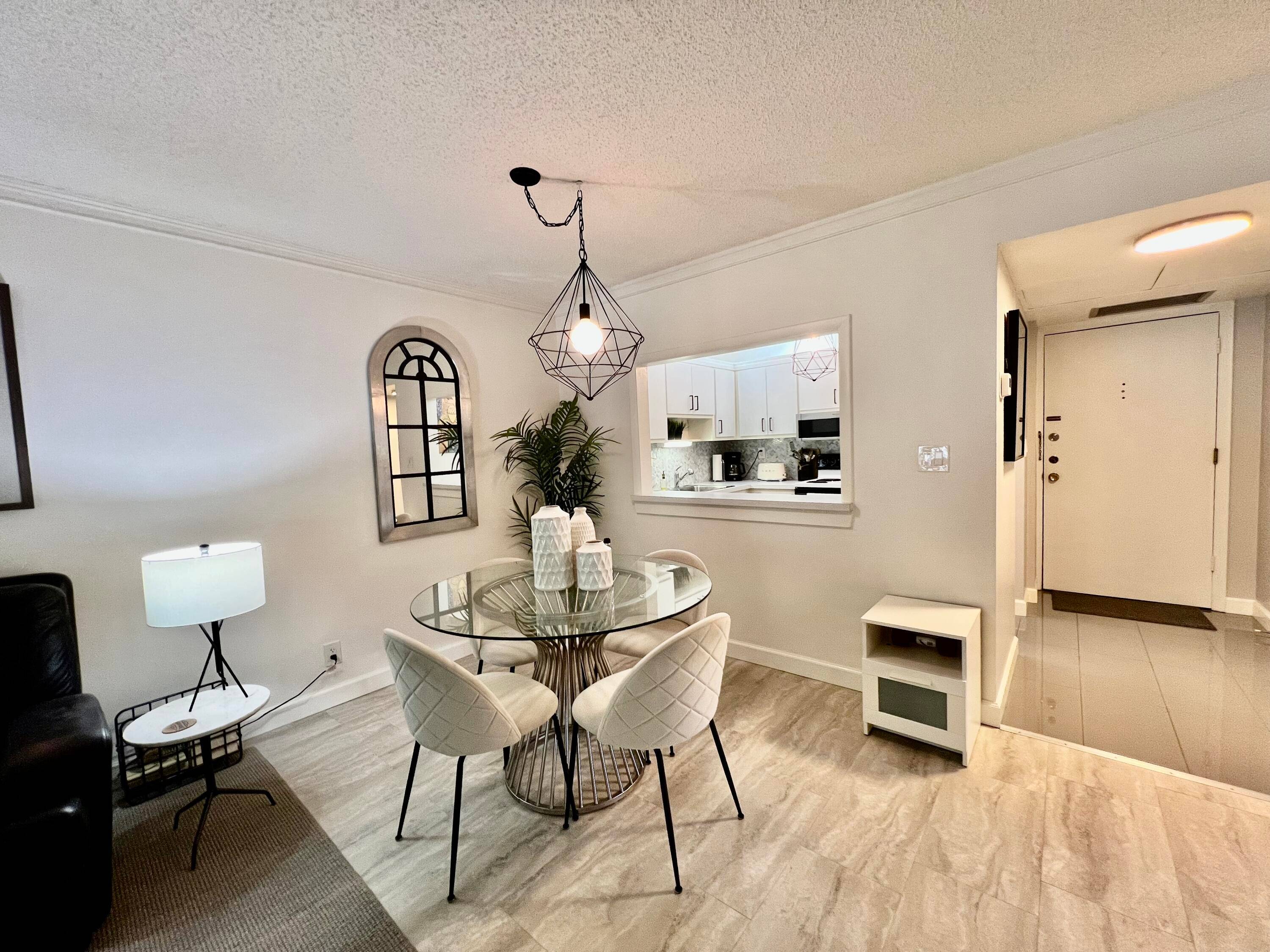 Modern and beautifully furnished 2BR 2BA corner unit in the desirable 55 Meadows community.