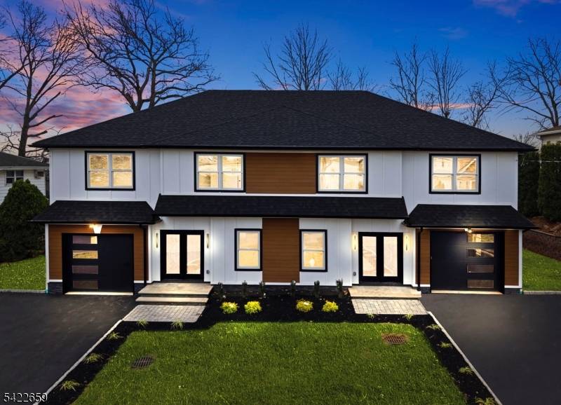 A brand new half duplex thoughtfully designed for modern living, this two story home impresses with a first floor that blends living, dining, and kitchen into an open concept space ...