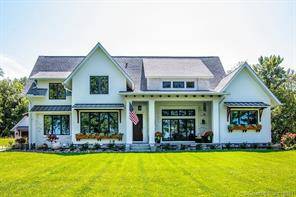 This Farmhouse features an open floor plan with propane fired stone fireplace and includes an unfinished Bonus Room.