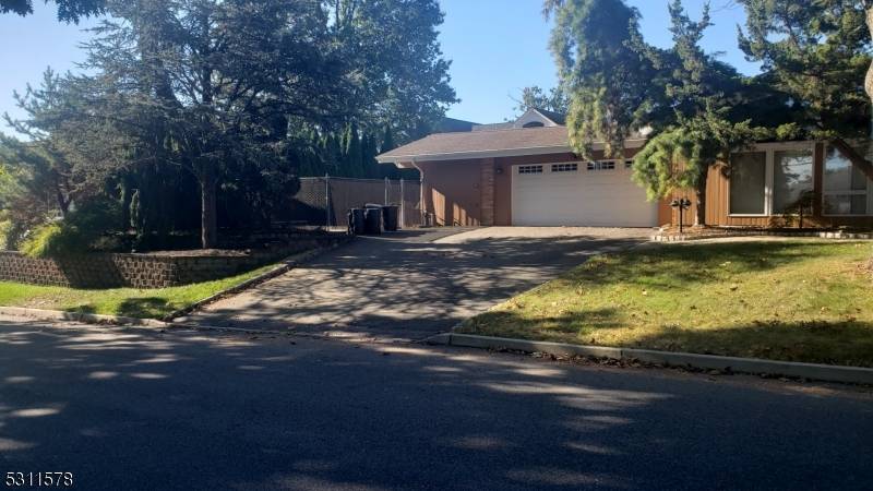 Must see Totowa ranch with lots of space ; Abundance of storage space ; Cathedral ceilings throughout ; Multiple driveways with plenty of parking ; In ground heated pool.