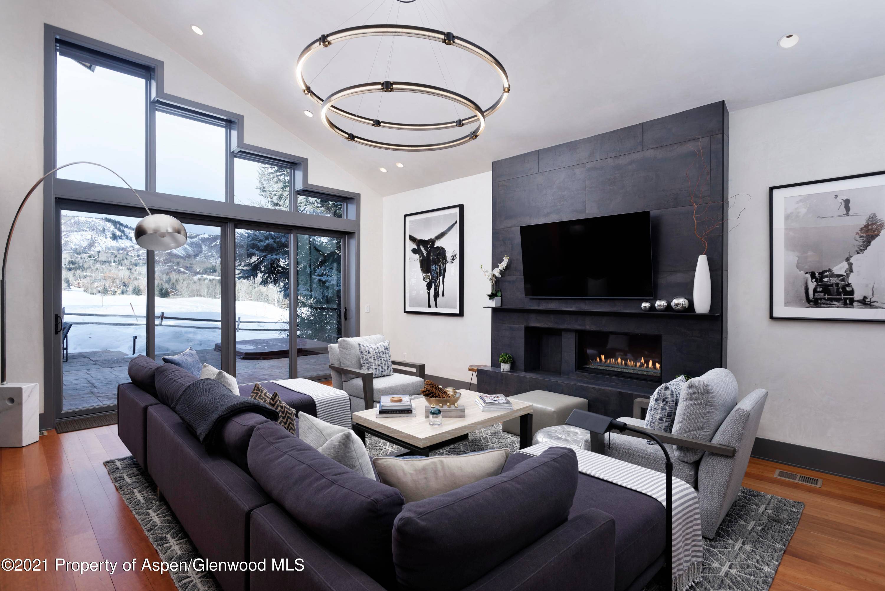 Clean lines and big views define this beautiful four bedroom home in Country Club Estates.