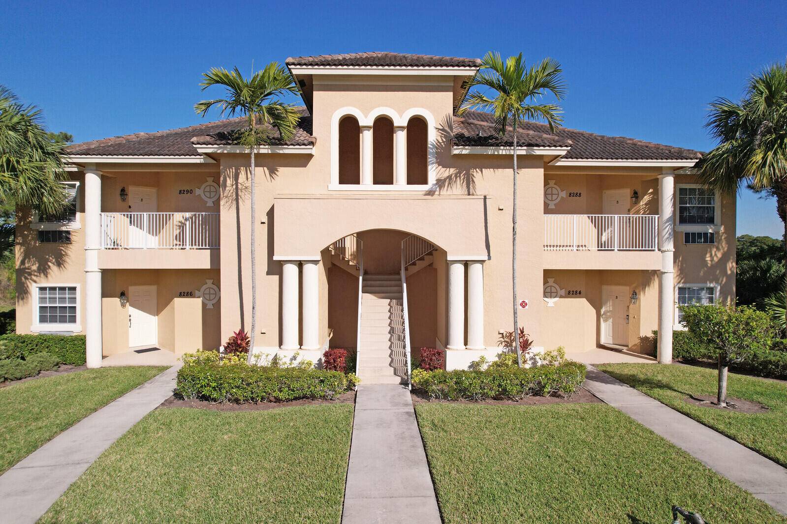 PGA VILLAGE CONDO WITH A SWEEPING VIEW OF THE PGA PETE DYE COURSE.