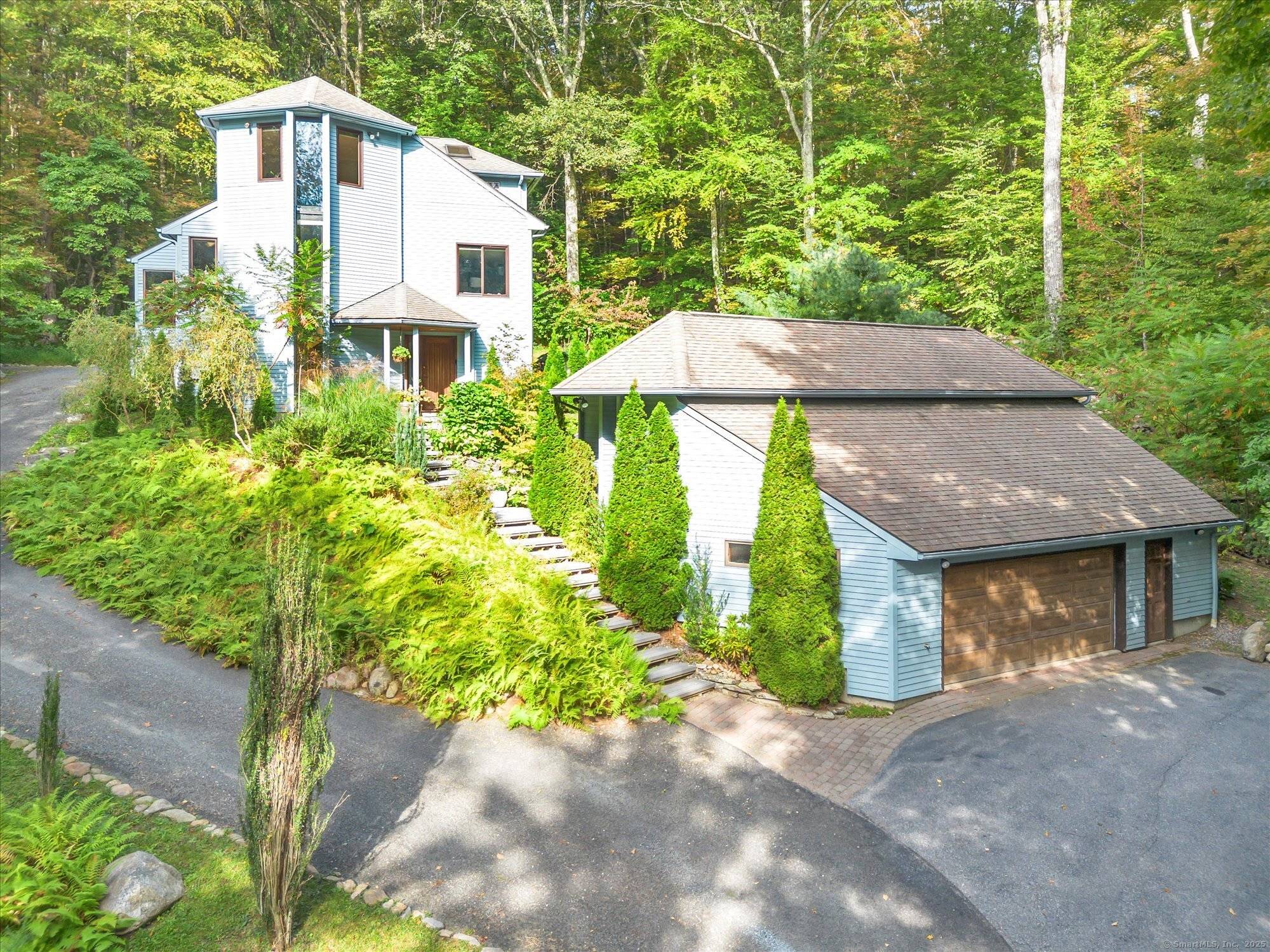 Set on 1. 58 private acres, this exceptional custom built home offers the ultimate escape into nature, where architectural beauty meets timeless craftsmanship.