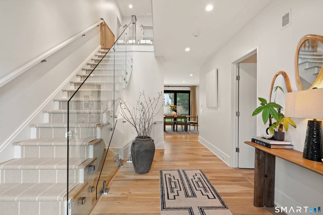 Better than new ! This beautifully appointed 4 level home blends contemporary design with warmth, comfort, and thoughtful upgrades throughout.