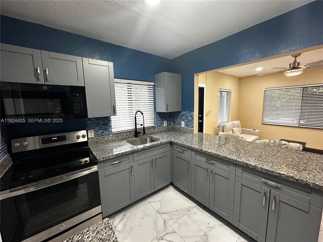 Turnkey Duplex Near Miami Design District Updated, Income Ready, and Packed With Potential located just three blocks from the Miami Design District.