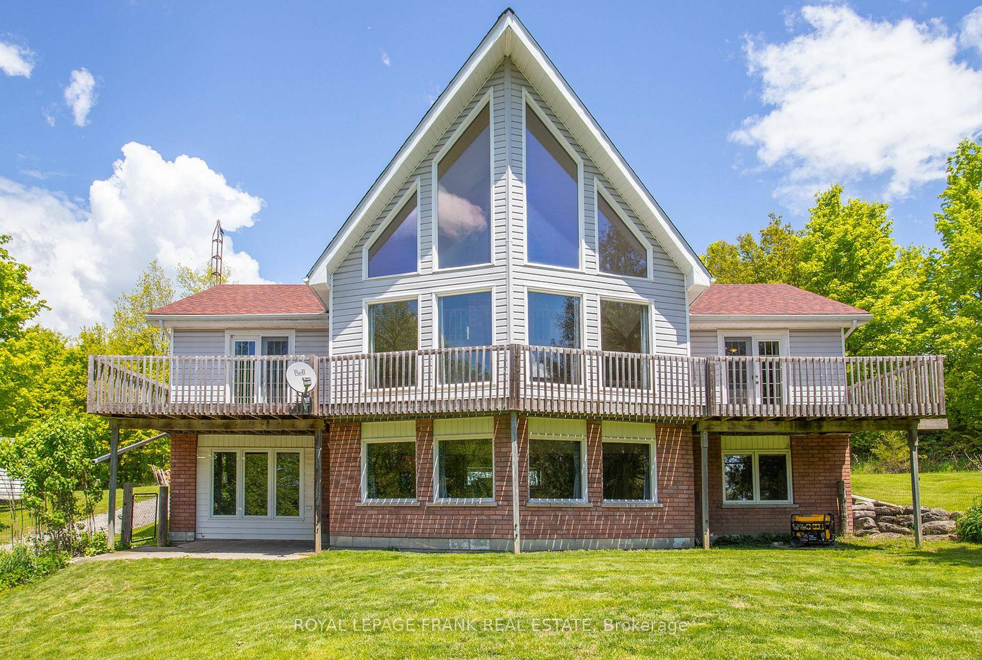 From inspirational sunrises to spectacular sunsets, this custom designed chalet style raised bungalow home North of Marmora is stunning.