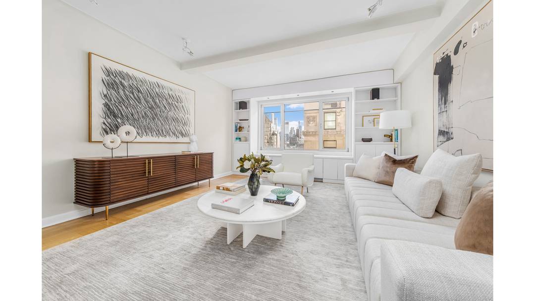 Bright and light, renovated and spacious, with city and oblique Central Park views, this 14th floor, two bedroom, two bathroom residence has so much to offer, including outdoor space !