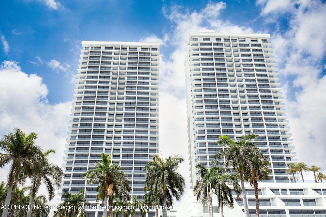 Lovely water views from this elegantly updated one story townhouse with over 3, 325 total sq.