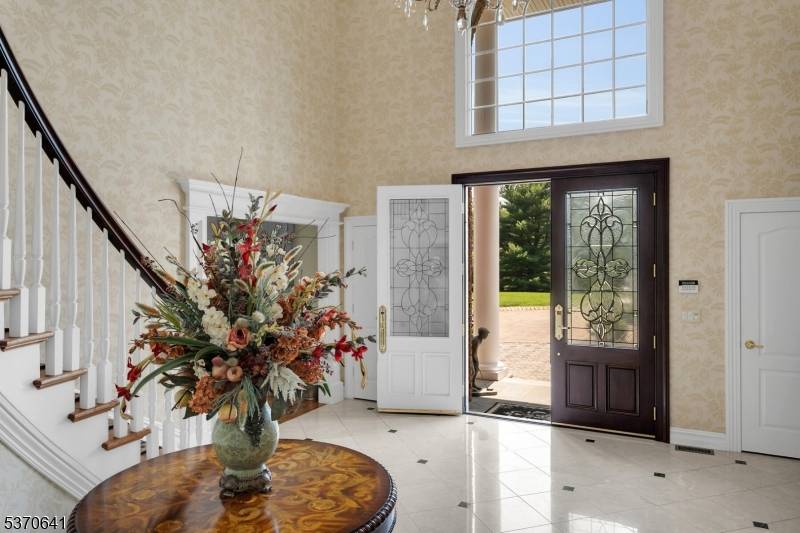 Welcome to this magnificent estate set on over 6 acres of meticulously landscaped grounds, offering the ultimate blend of sophistication, comfort, and resort style amenities.