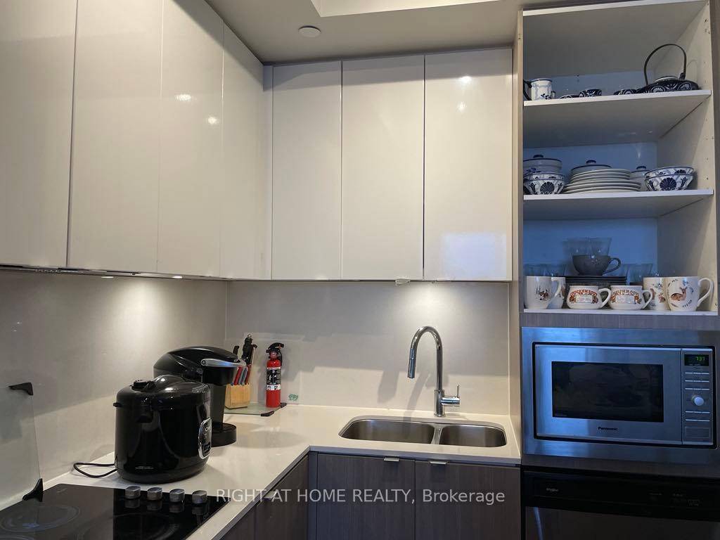 Sun Filled 1 Bed Den with Oversized Terrace amp ; Rarely offered 2 Parking Spots at 5220 Dundas St, Burlington.