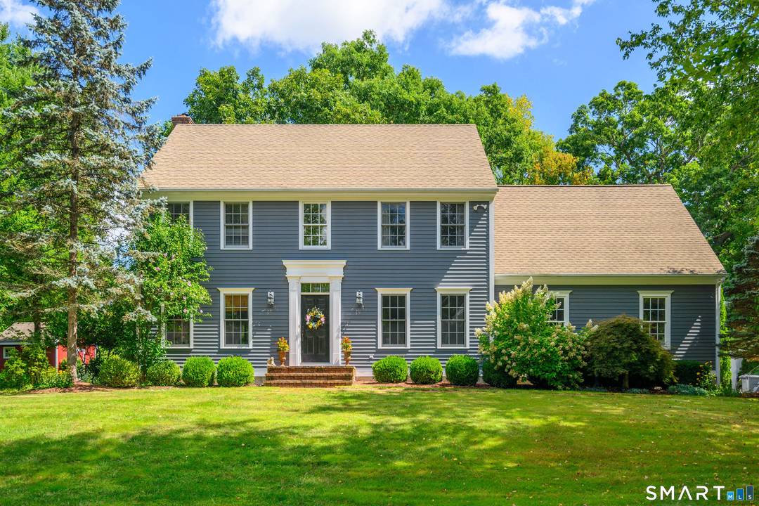 Beautifully maintained Colonial set on a level lot in a peaceful rural setting with an inground pool and thoughtful updates throughout.