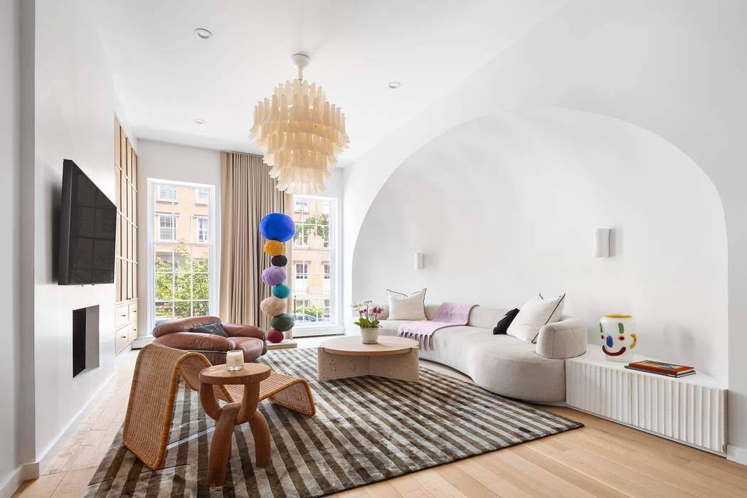 Enter a truly unique property, a rare brownstone condo on one of Chelsea s most coveted, tree lined blocks.