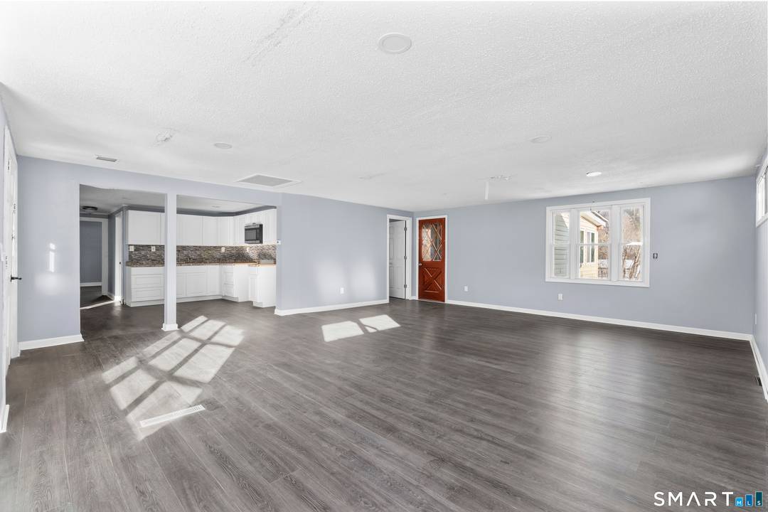 Space, flexibility, and location come together in this spacious cape style home.