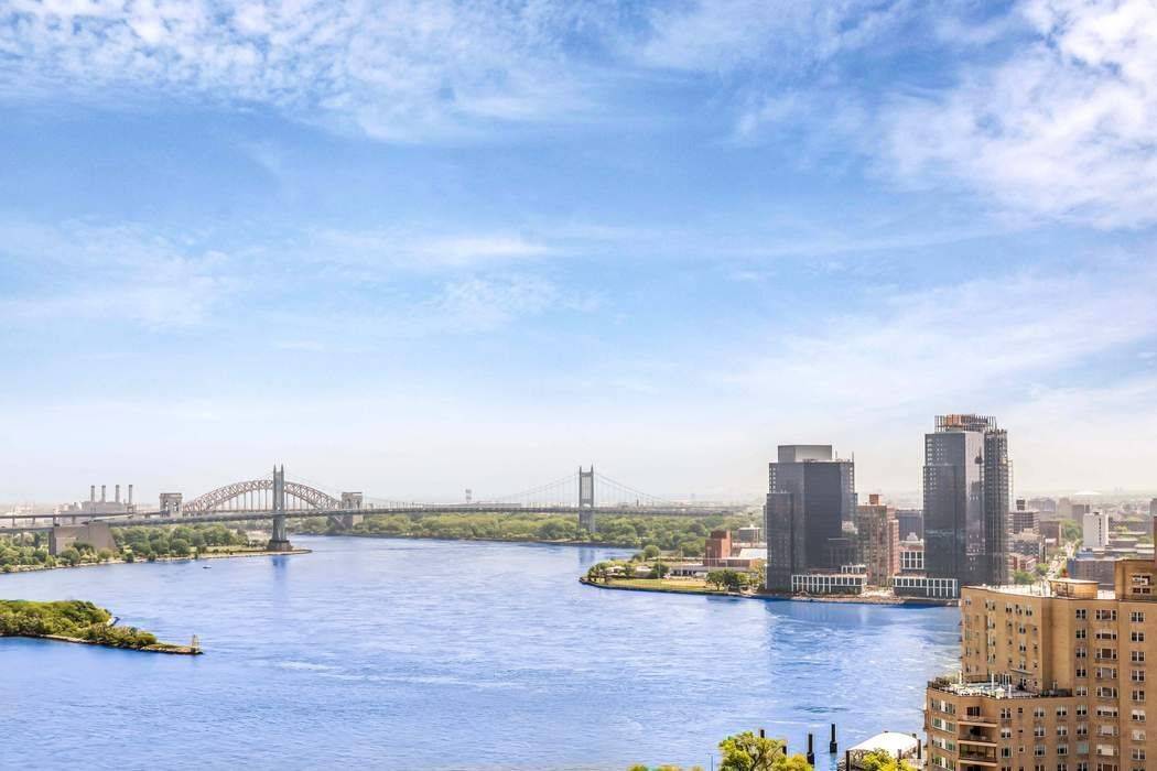 Spectacular river and city views from ALL rooms of this beautifully renovated home.