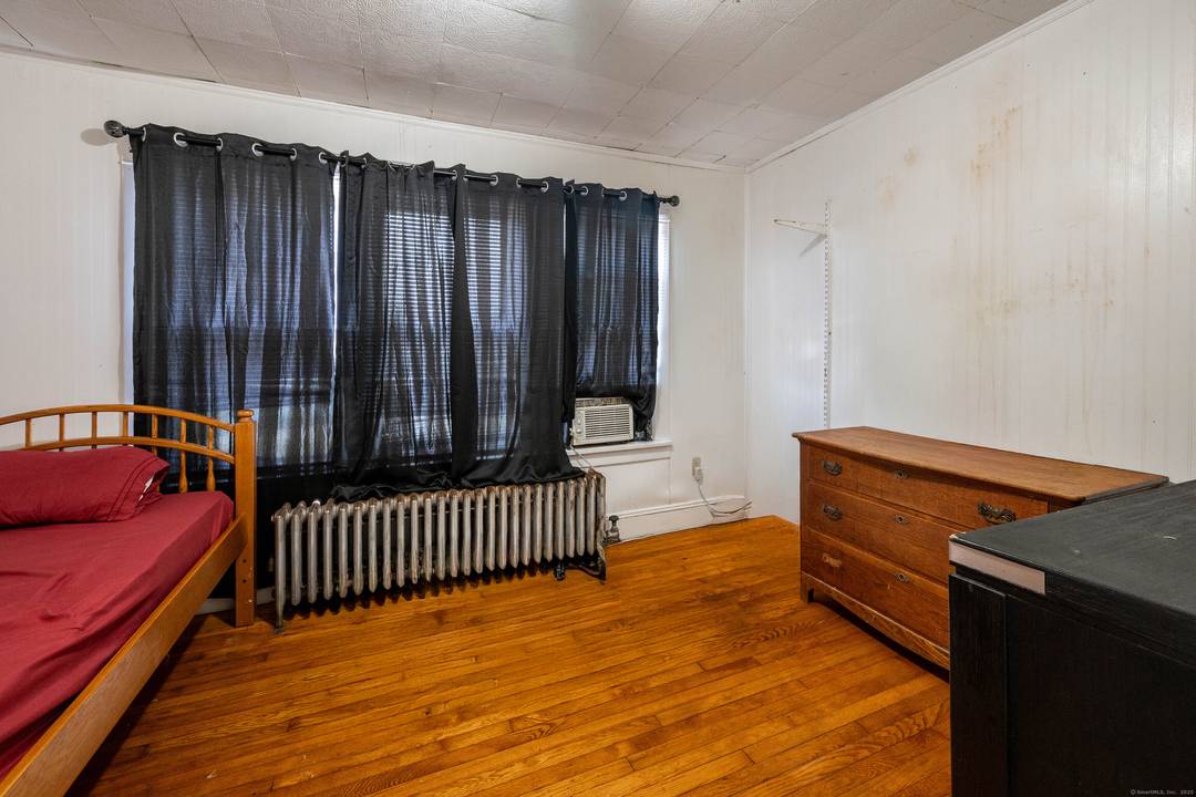 Spacious and updated two family home with 3 bedrooms in each unit.