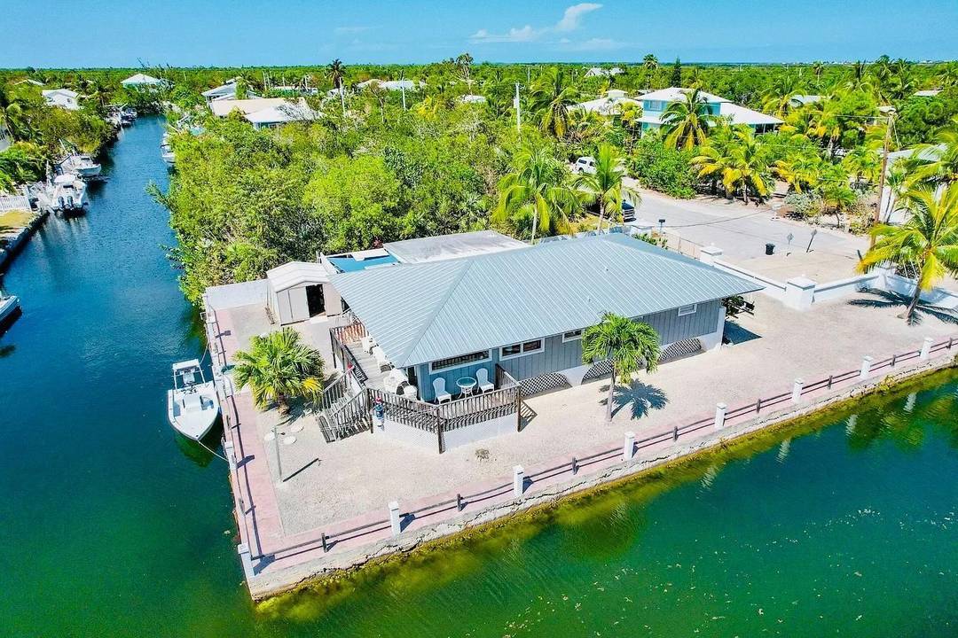 Fishermans Dream House ! Bring your boats to this beautiful canal front home in Big Pine Key.