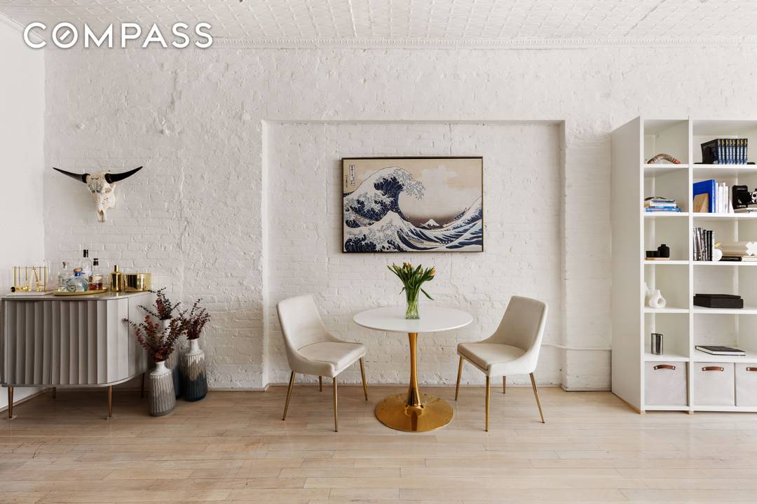 Iconic Pre War Loft in the Heart of Greenwich Village This architecturally stunning pre war loft seamlessly blends historic charm with modern living.