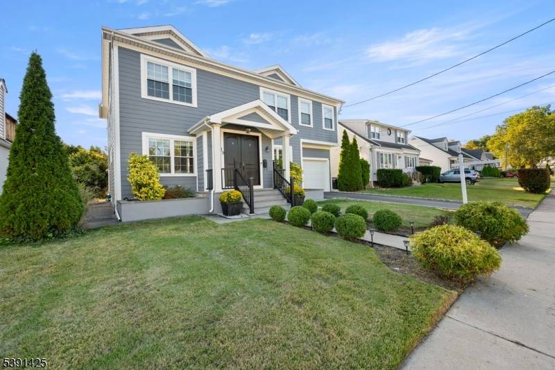 Welcome to this exceptional custom home in Rochelle Park, beautifully remodeled custom home that perfectly blends modern luxury with timeless elegance.
