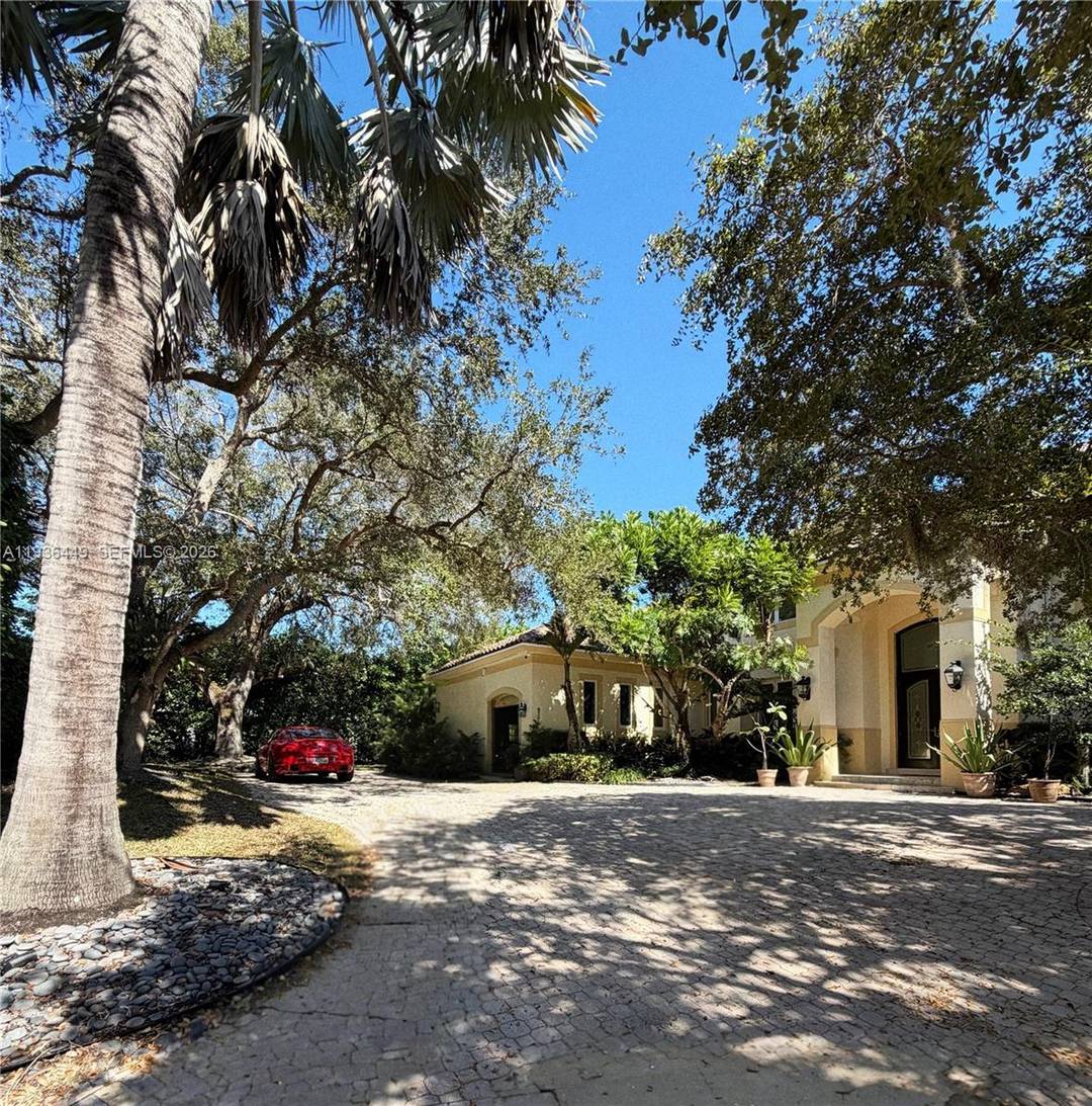 Strategic Price Repositioning PRIVATE OLD CUTLER OAKS ENCLAVE Completely Renovated in 2025 Timeless Elegance in an Exclusive Gated Setting A stately custom residence tucked within Private Old Cutler Oaks, an ...