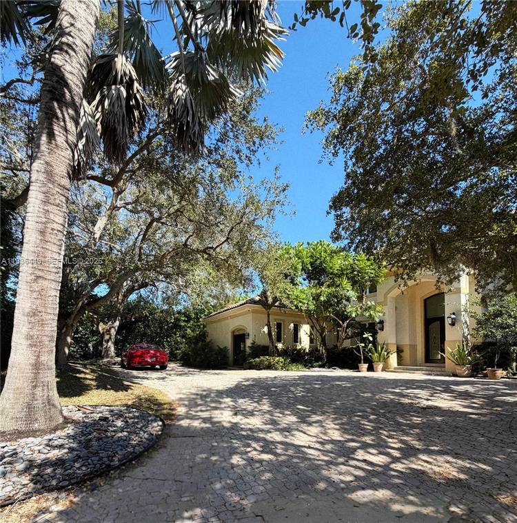 Strategic Price Repositioning PRIVATE OLD CUTLER OAKS ENCLAVE Completely Renovated in 2025 Timeless Elegance in an Exclusive Gated Setting A stately custom residence tucked within Private Old Cutler Oaks, an ...