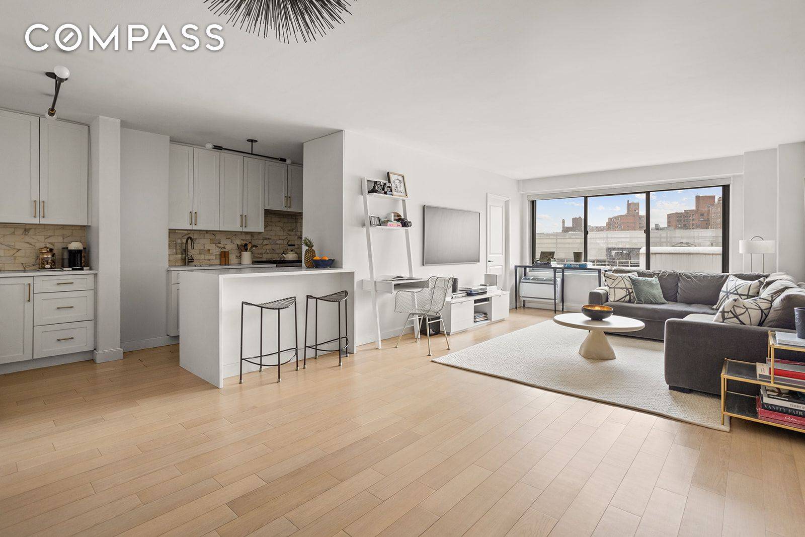 Scarcely available and fully renovated one bedroom home office nursery CONDO with open Western views of the West Village and beyond.