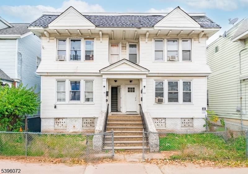 Large 4 family live in one and rent the other units.