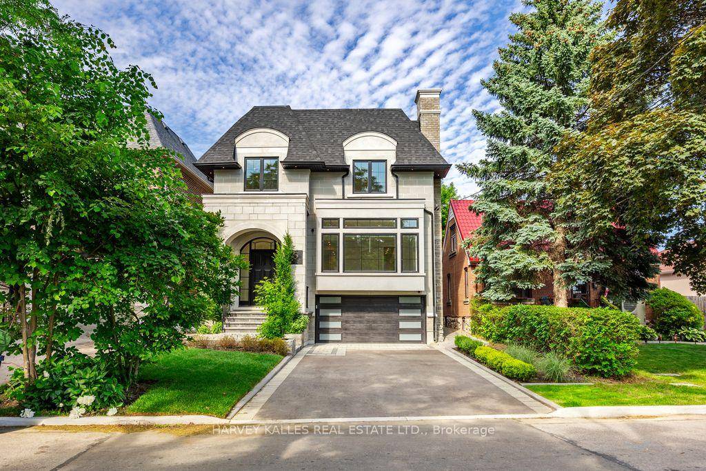 Elevator access to all three levels sets the tone for this stunning custom built home in the heart of Clanton Park.