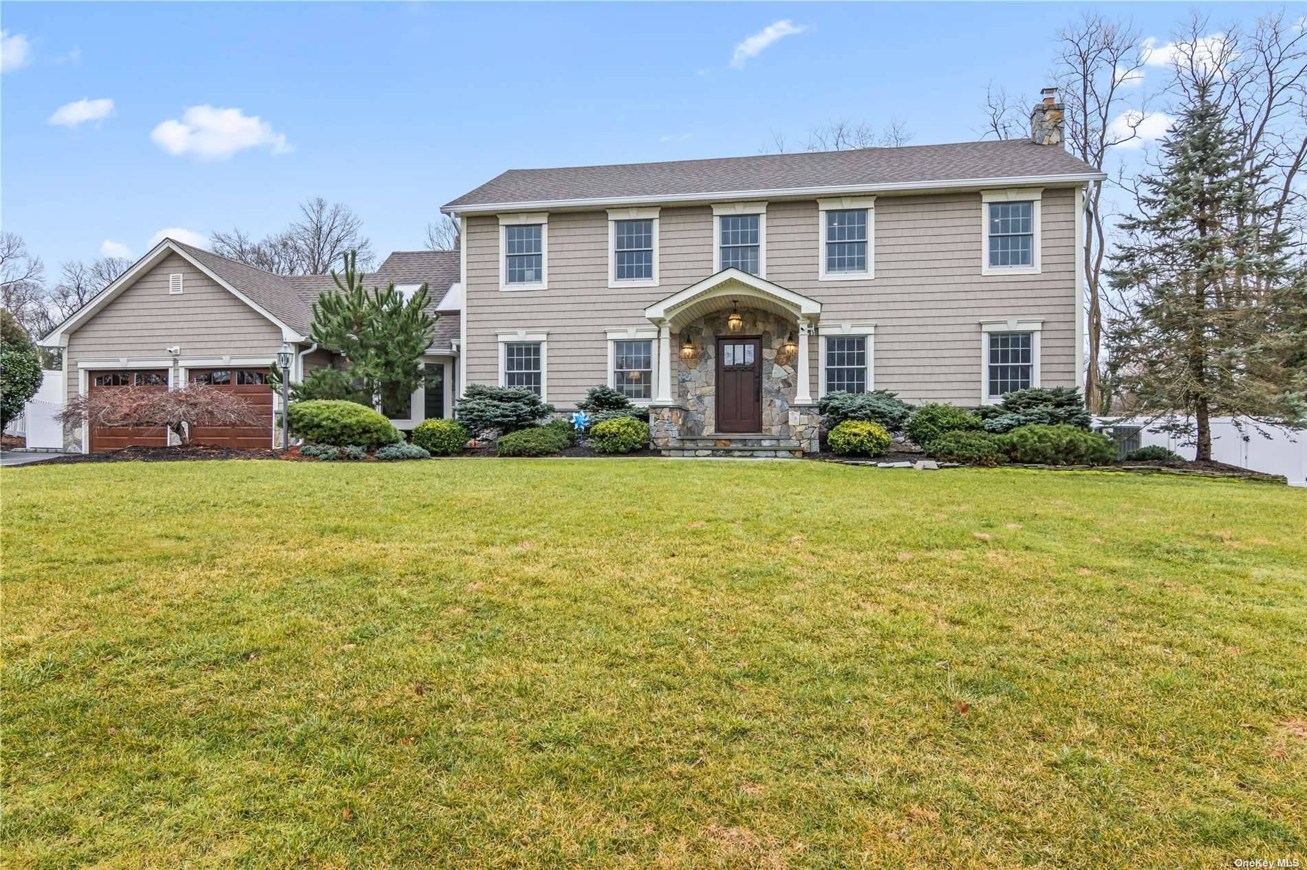 This Fabulous Island Estates Colonial Has Been Recently Renovated with Incredible Attention To Detail and Is One Of The Largest Colonials In The Community.