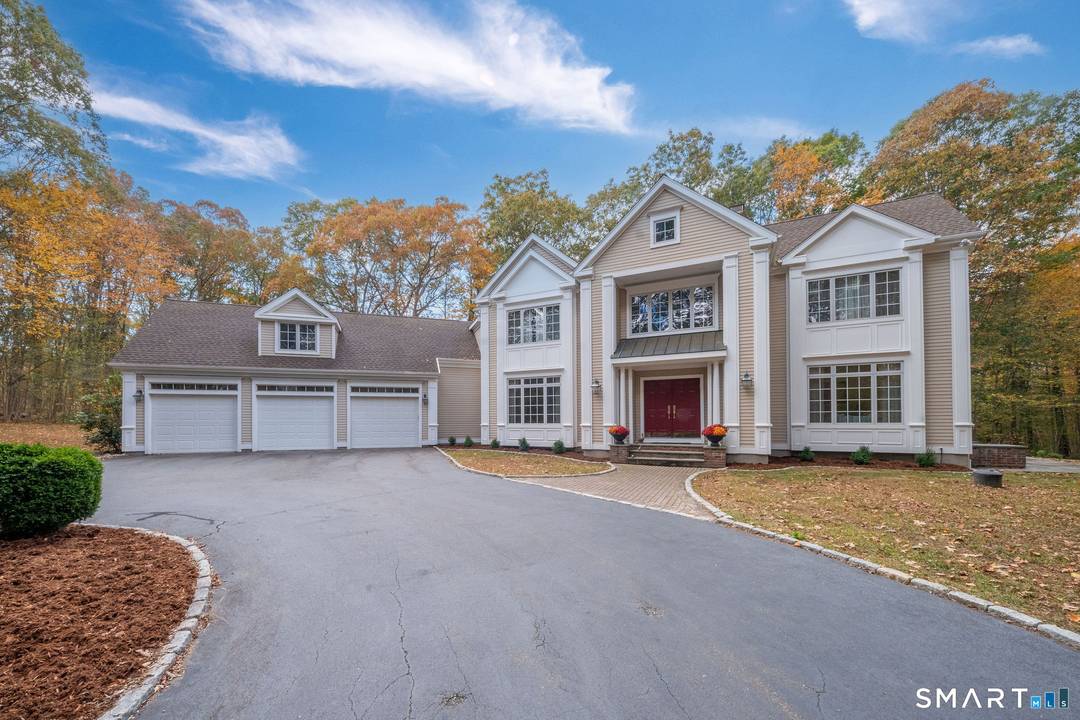 Nestled in a sought after neighborhood and privately set back from the cul de sac, this beautiful and well maintained Madison Colonial features 5 bedrooms and 4.
