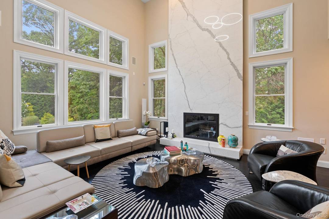 Welcome to 20 Stonewall Circle, a stunning residence offering over luxury living in the heart of West Harrison.