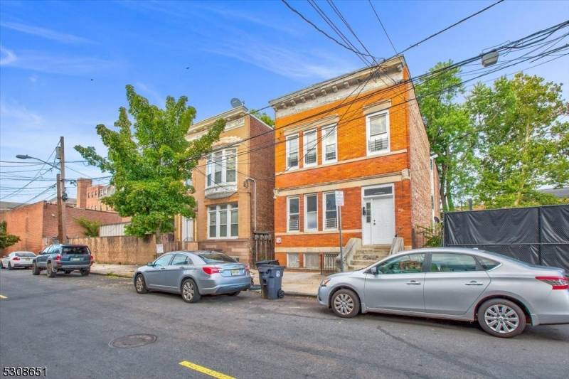 Back on Market ! Totally renovated and gorgeous 2 family house with beautiful brick exterior.