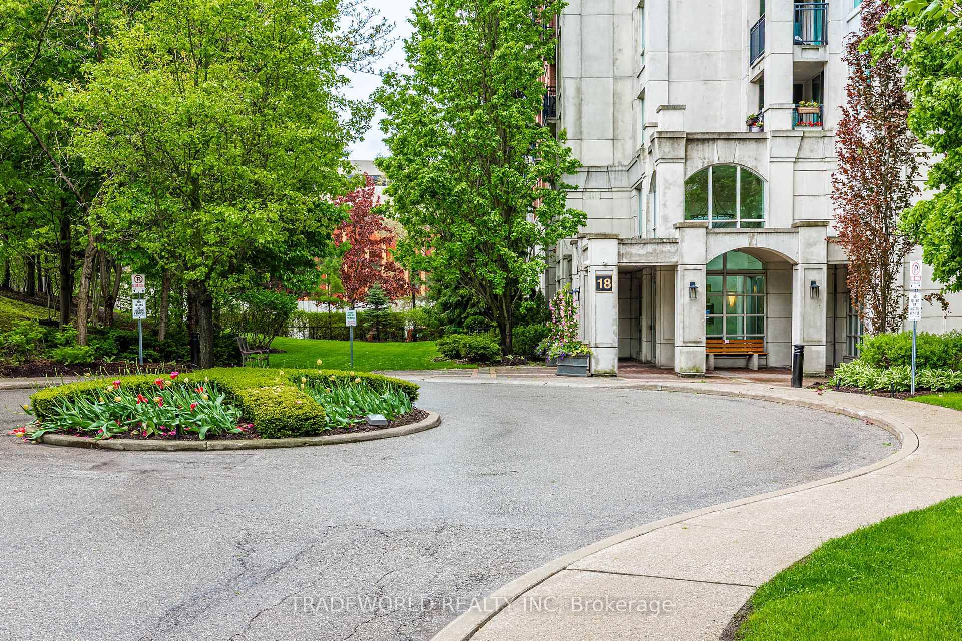 Bright and spacious luxury corner unit with a lovely wooded view.