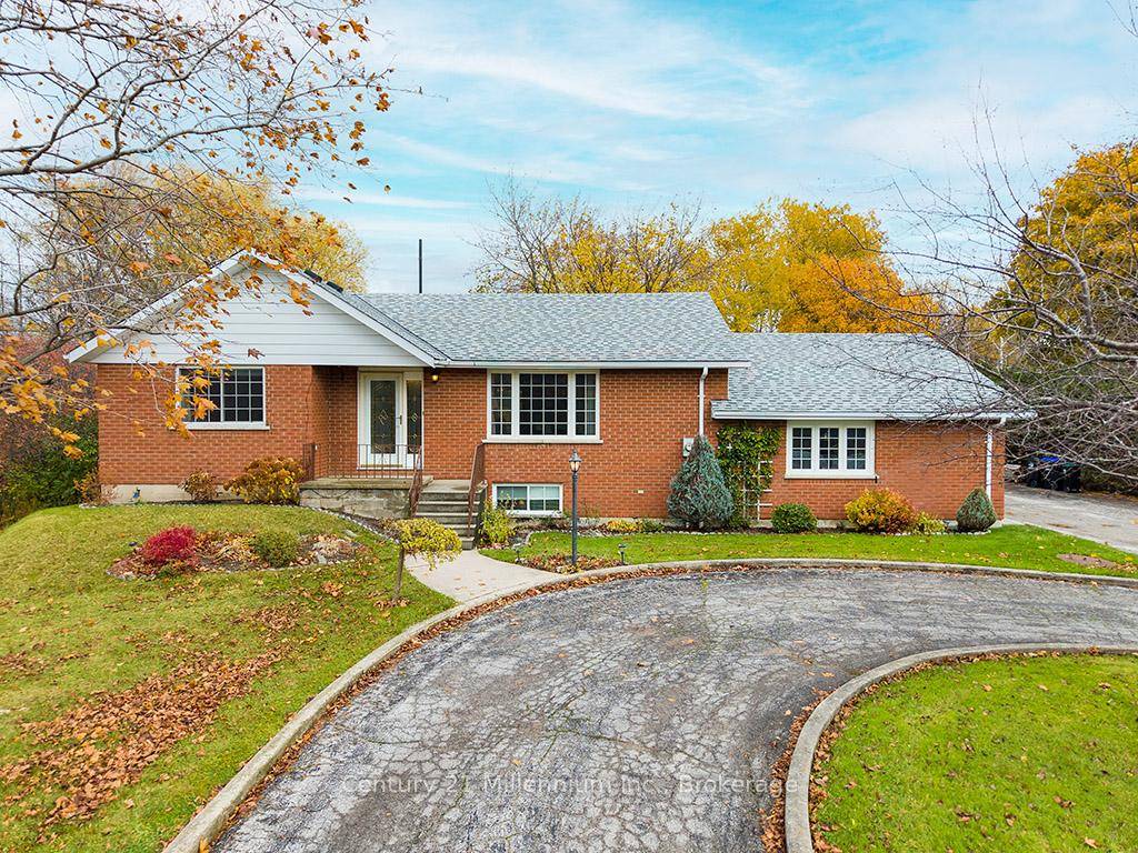 Nestled within a picturesque parcel of land on just over an acre with the Silver Creek gently meandering through the property, this magnificent brick bungalow offers a true retreat like ...