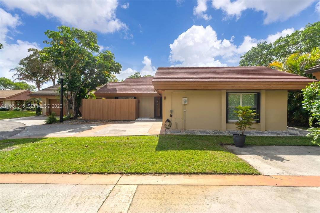 Experience refined living in this beautifully remodeled 3 bedroom, 2 bath patio home located in a private gated community in North Miami Beach.