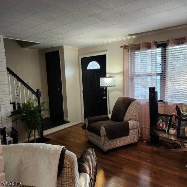 A Must See ! ! This lovely home is tucked away in a beautiful area, featuring 4 bedrooms, 1 1 2 baths, living room, galley kitchen, separate dining room.