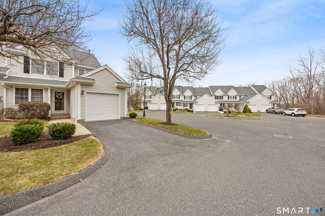 Welcome to this Chestnut model end unit located in a private cul de sac of Sterling Woods, offering the feel of a single family home.