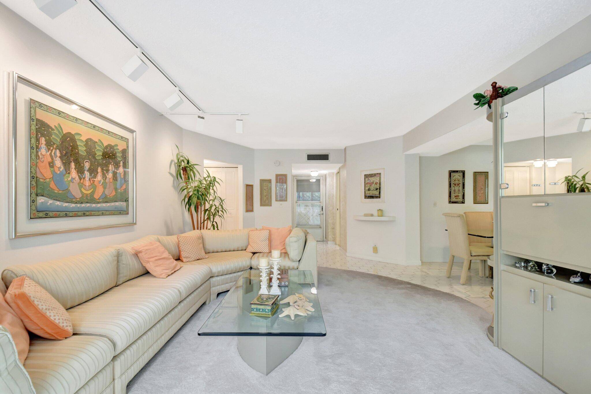WELCOME TO THIS CHARMING, SPARKLING, TURNKEY CONDO.