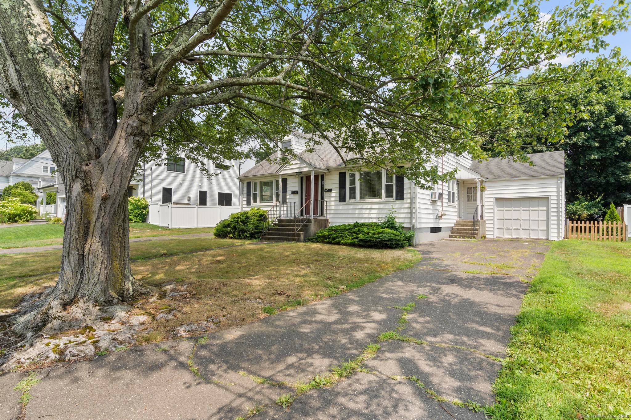 A unique side by side two family home situated on a quiet cul de sac in a sought after neighborhood.