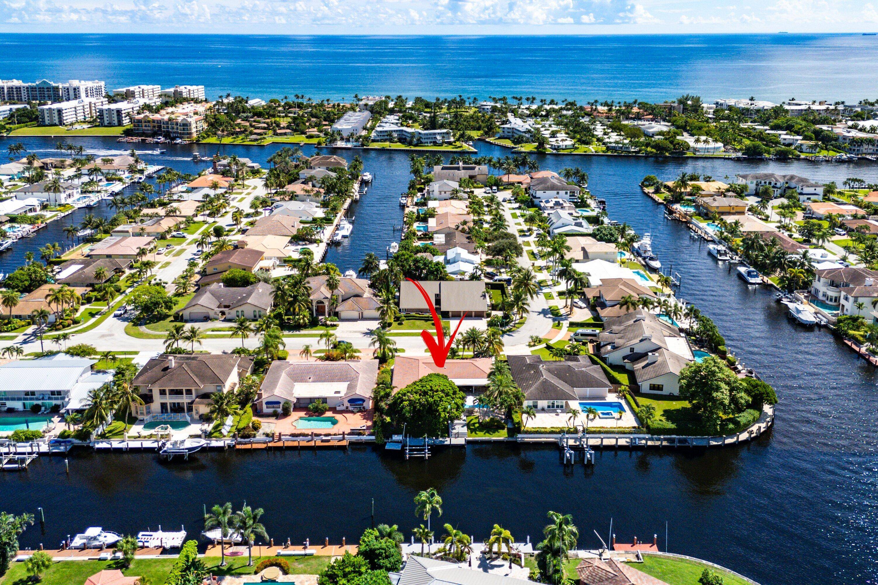Welcome to 1219 SE 15th Avenue, a modern waterfront retreat in the heart of Deerfield Beach's coveted Cove neighborhood.