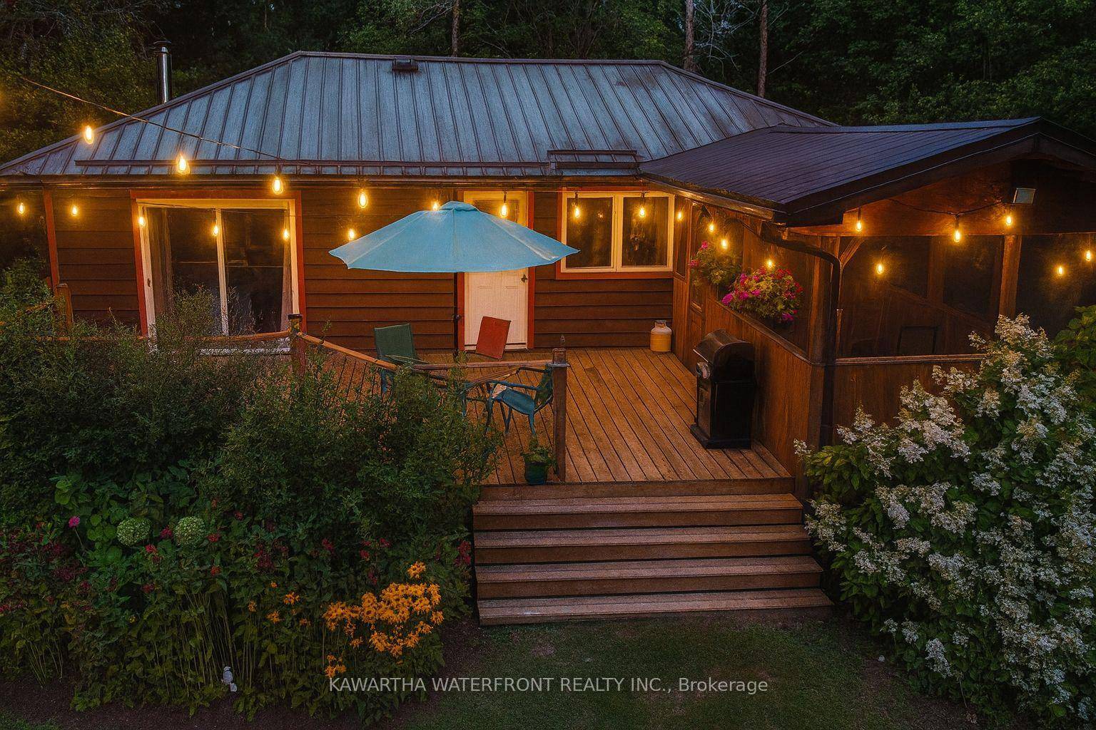 Tucked along the rivers edge, this cottage combines thoughtful upgrades with timeless charm for effortless, year round enjoyment.