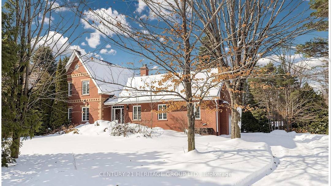 A rare opportunity to own a stunning 23 acre private estate offering the perfect blend of luxury, nature, and convenience, all just minutes from Hwy 404.