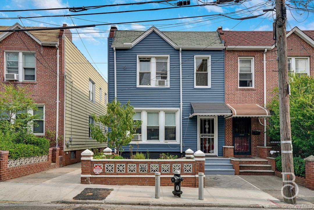 Quiet Ditmars block brick two family with parking amp ; yard !