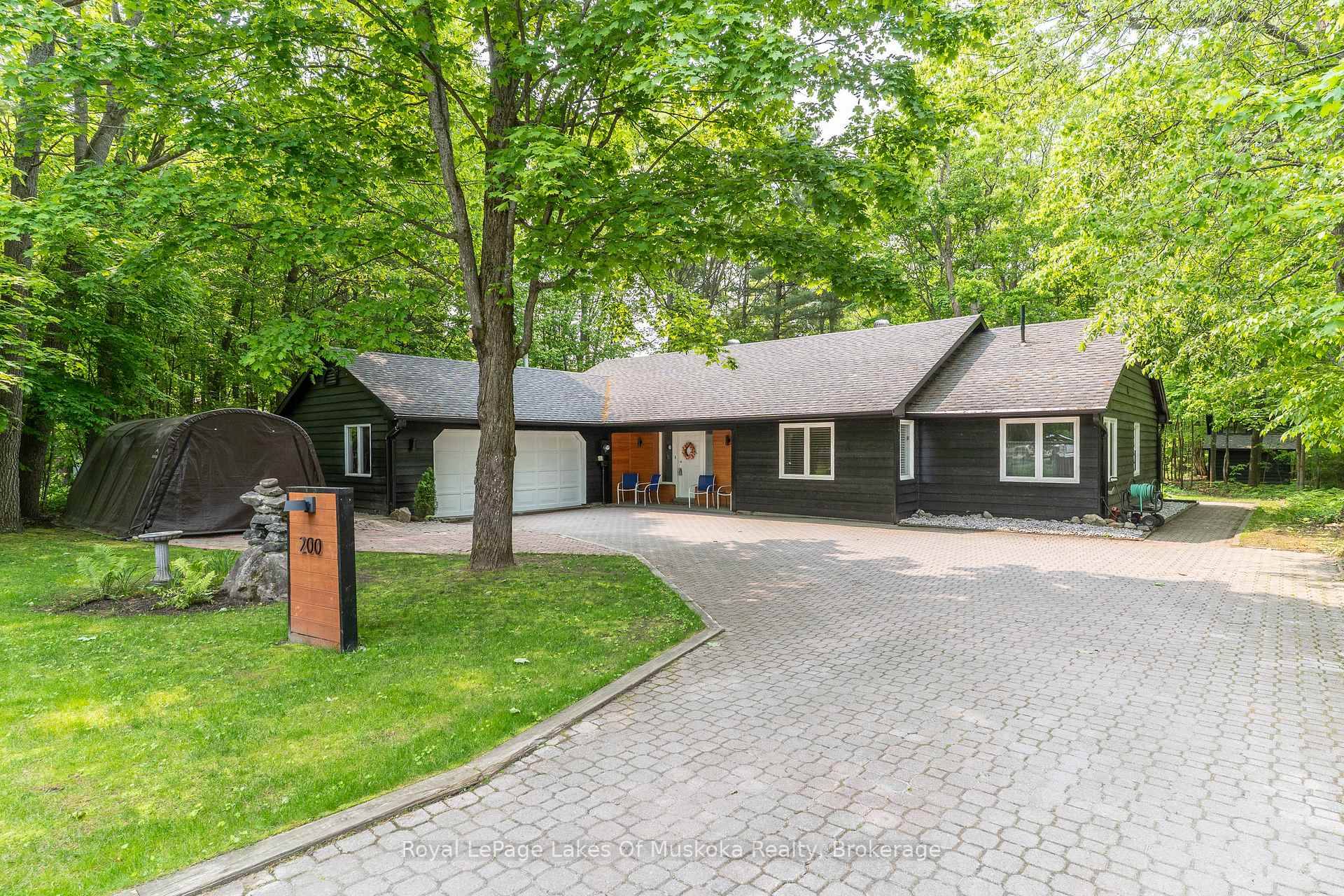 In one of Gravenhurst's most coveted Cul De Sac locations sits this well appointed bungalow offering true one level living with a forested backdrop.