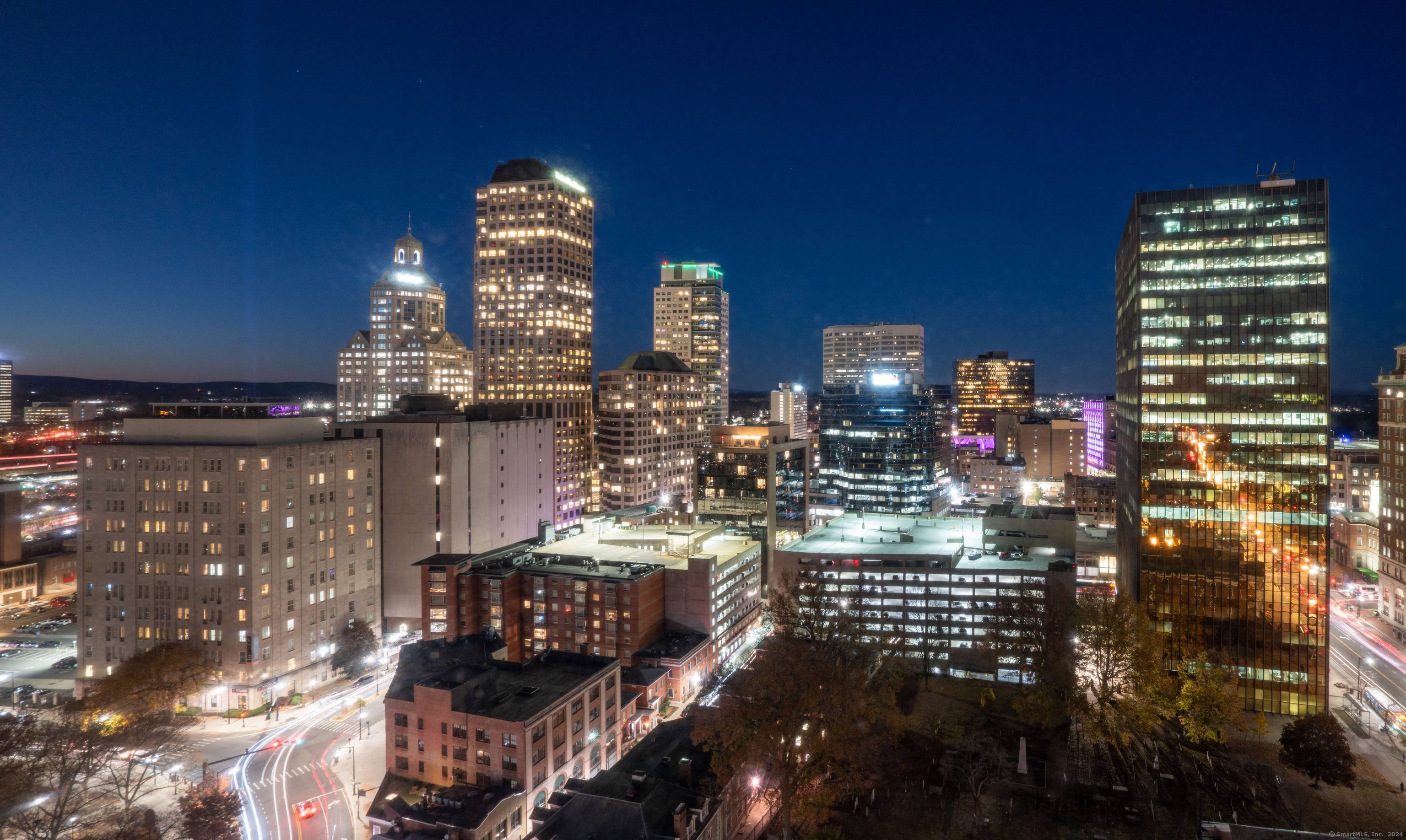 Experience the pinnacle of downtown living in this stunning 24th floor condo at the renowned Bushnell Tower, designed by architect I.