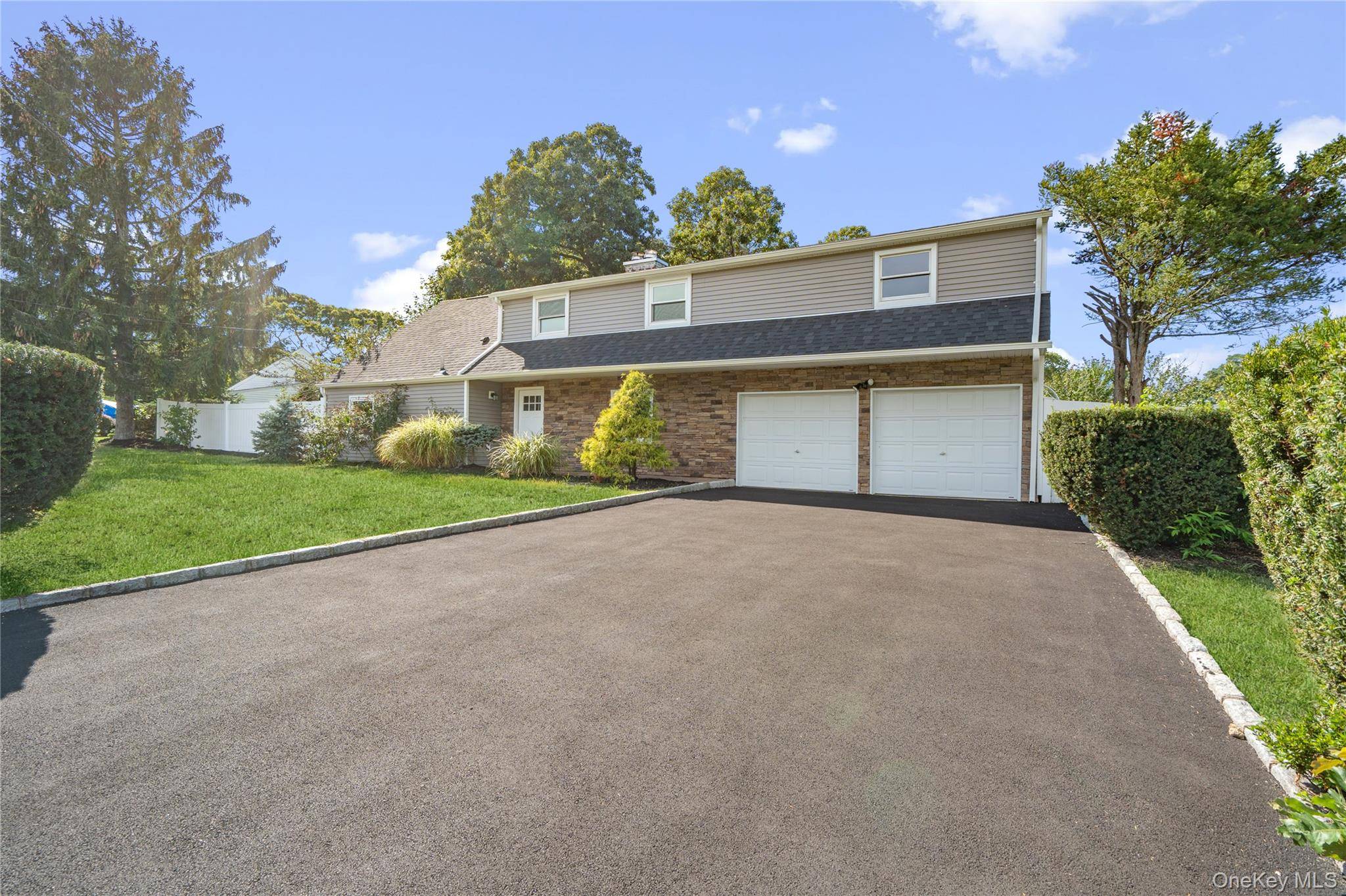 Stunning Colonial in the heart of Selden Oaks.