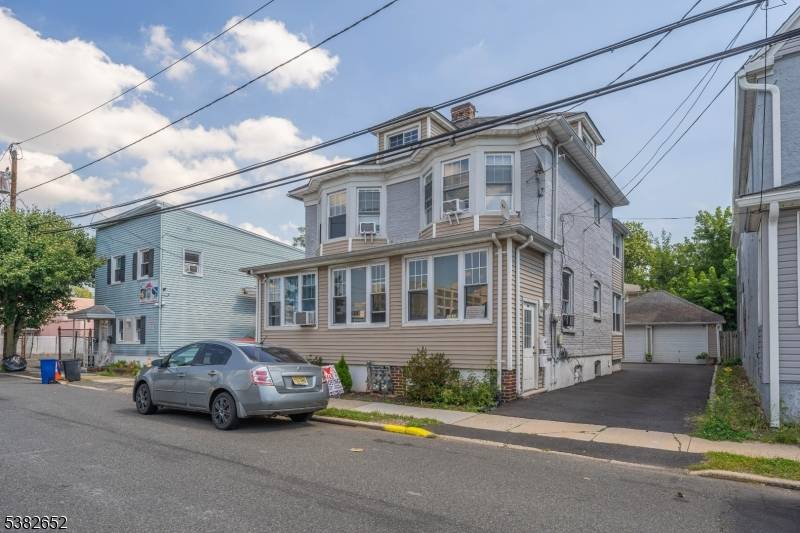 Well maintained two family home featuring two apartments, each with 2 bedrooms and 1 bathroom.